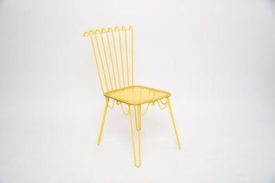 4 chaises jaunes Mathieu Mategot modele Cap d'Ail