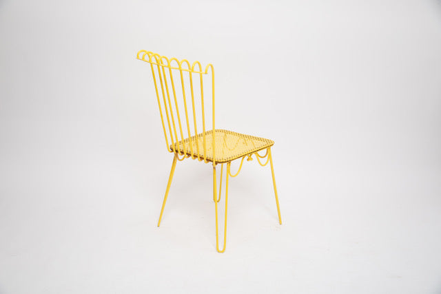 4 chaises jaunes Mathieu Mategot modele Cap d&